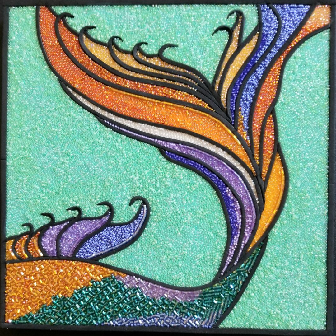 A bead mosaic of a mermaid’s tail